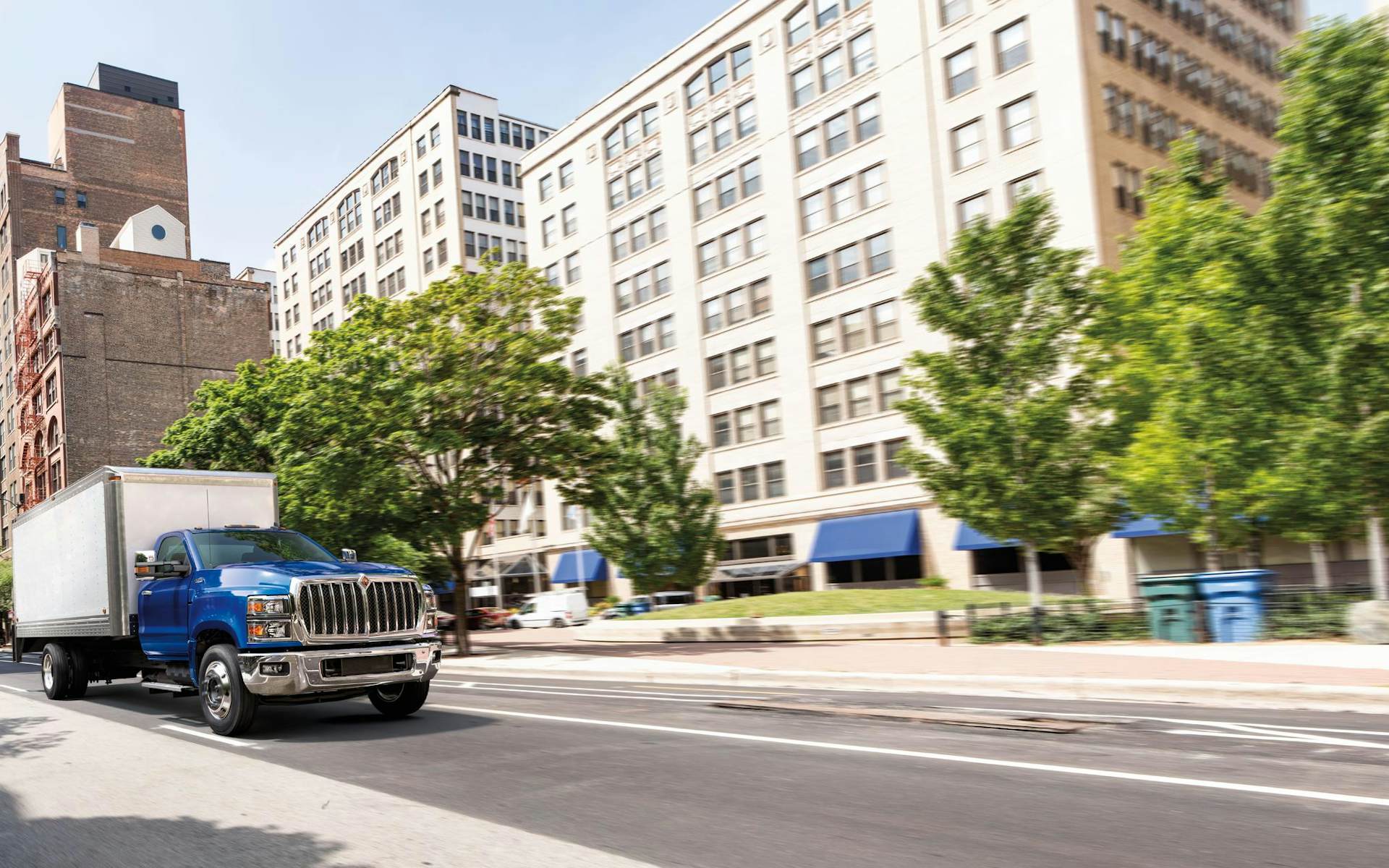A blue truck on the street