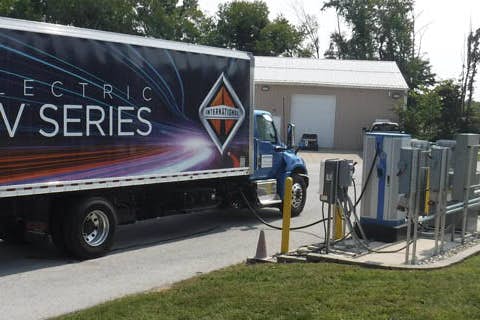 A truck with a large advertisement on the side