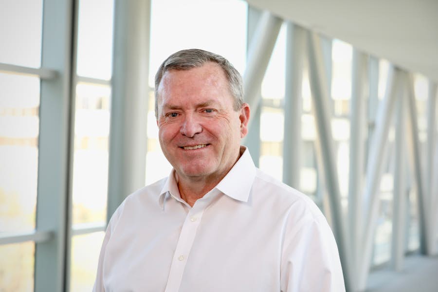 A person wearing a white shirt