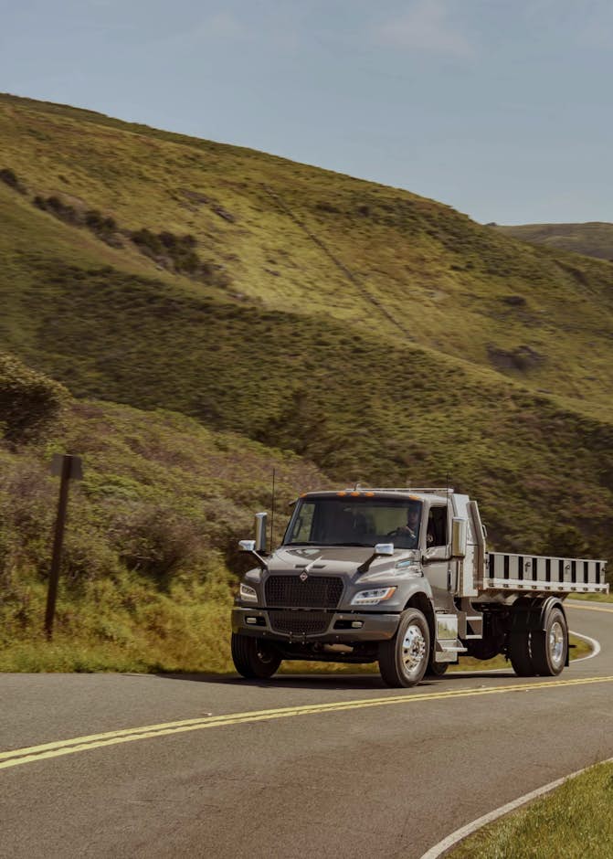 A truck driving on a winding road