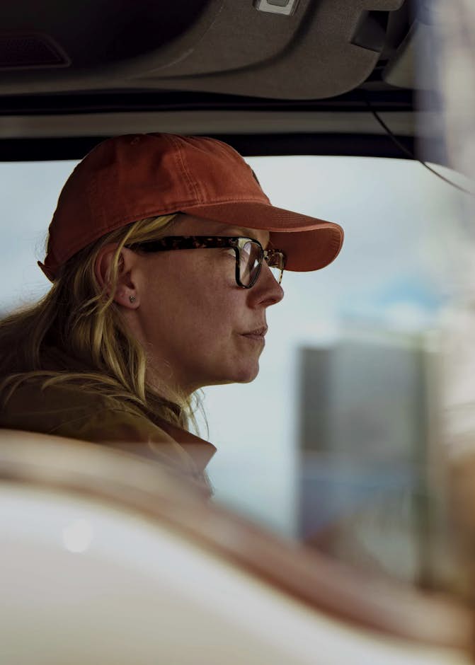 international female driver close up driving