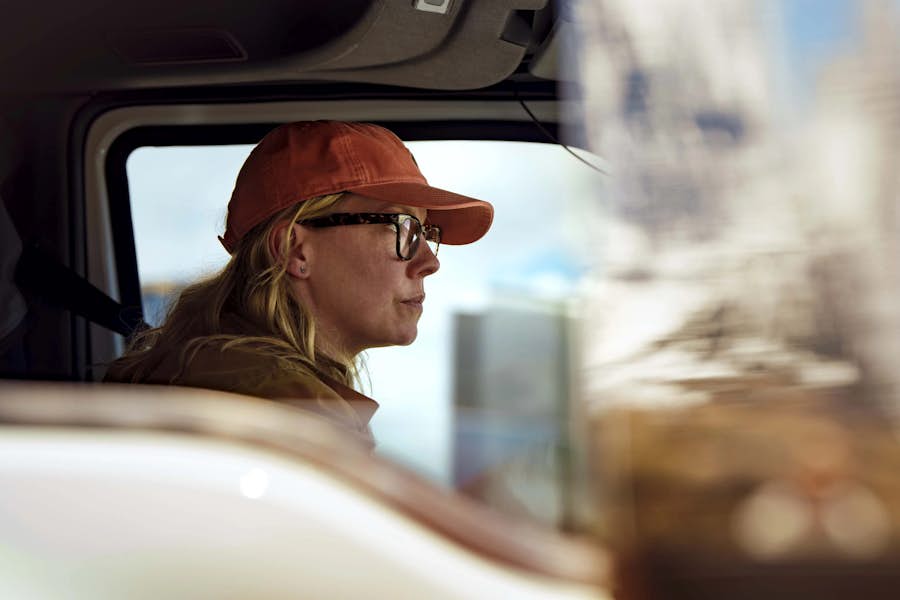 international female driver close up driving