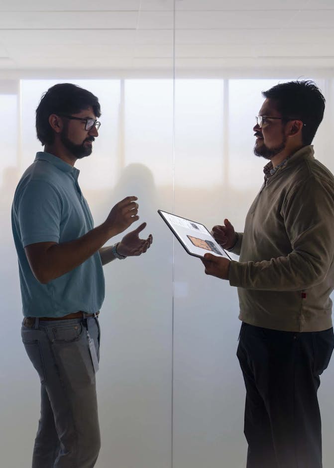 international-two-male-employees-ATC-office