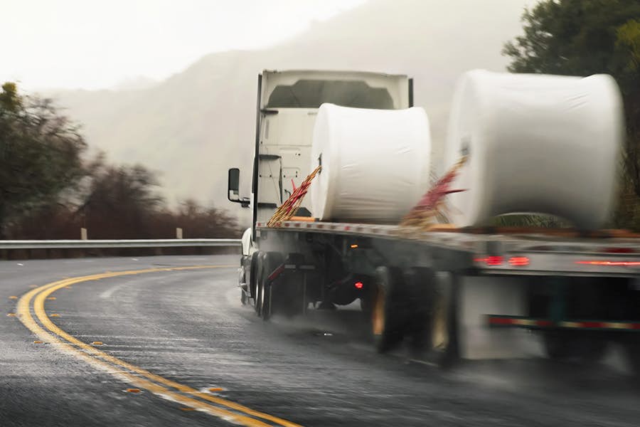 Truck driving along a road